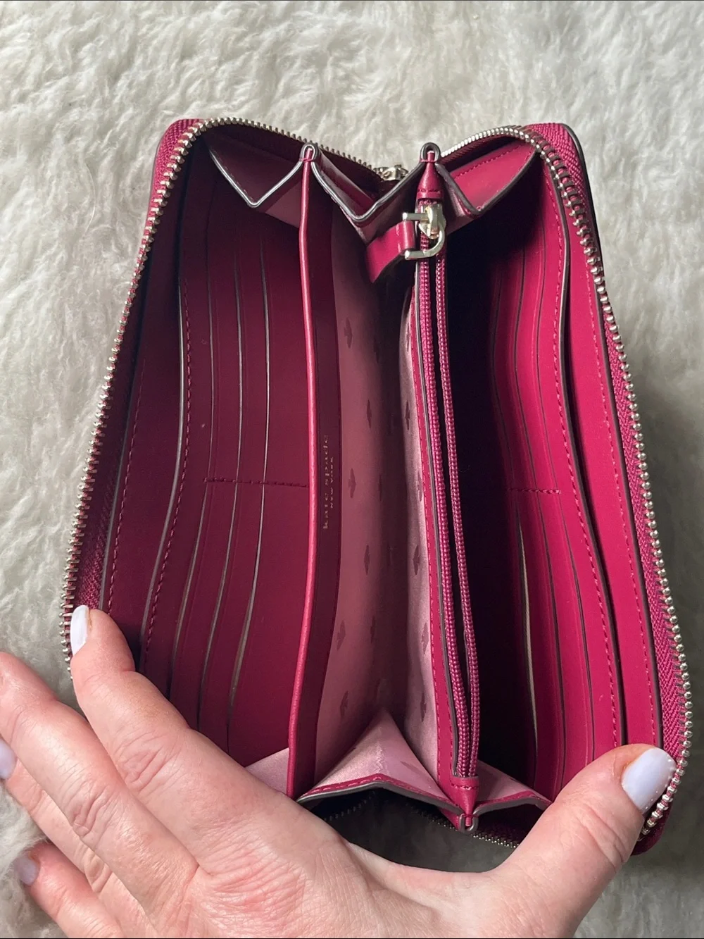 kate spade raspberry pebbled leather zip-around wallet